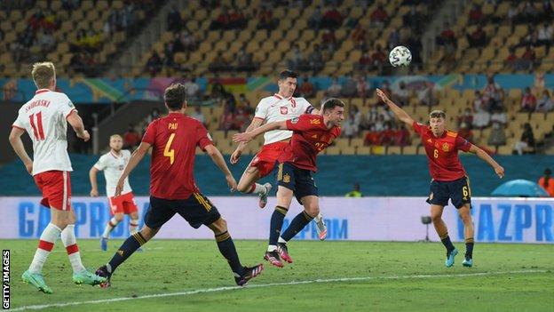 Robert Lewandowski scores for Poland against Spain