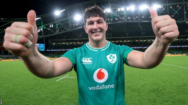 Tom Stewart celebrates on the pitch