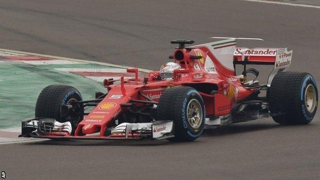Sebastian Vettel steers the new Ferrari SF70H in Maranello, Italy