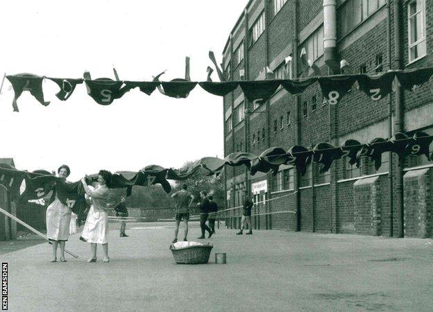 Ken Ramsden's mum and aunty hanging shirts outside Old Trafford