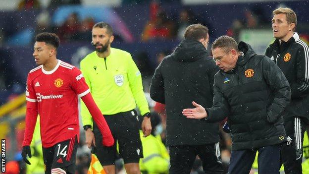 Manchester United attacking midfielder Jesse Lingard (left) and the club's interim manager Ralf Rangnick (second from right)