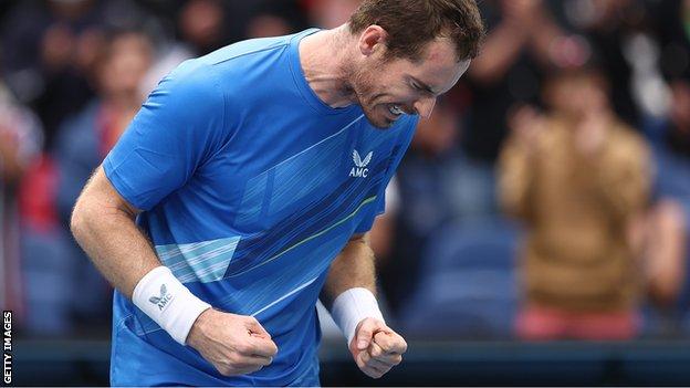 Andy Murray celebrates beating Nikoloz Basilashvili at the Australian Open