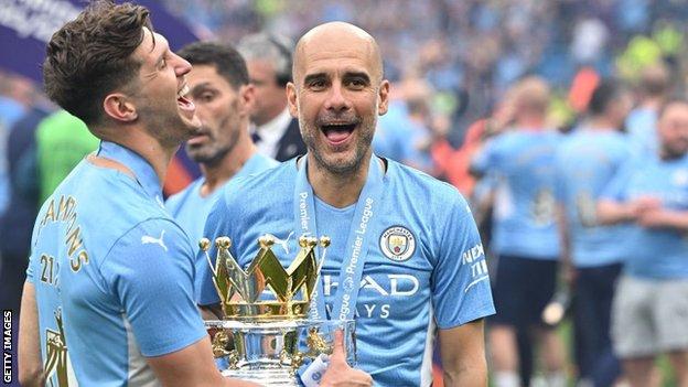 Pep Guardiola celebrates winning the Premier League