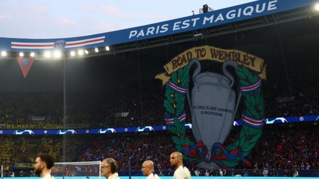 PSG tifo shows the Champions League trophy