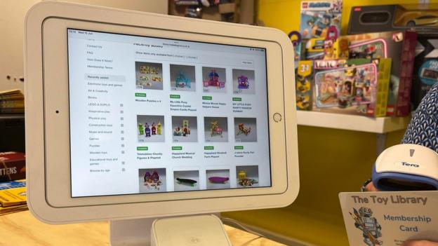 iPad with library website on screen.