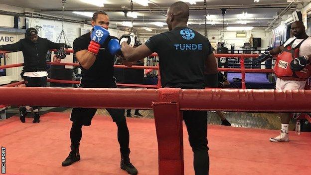 Yarde works out with Tunde Ajayi, while pad men Ade Olayinaka (right) and Martin Malcolm watch on