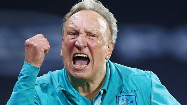 Neil Warnock celebrates the Huddersfield equaliser