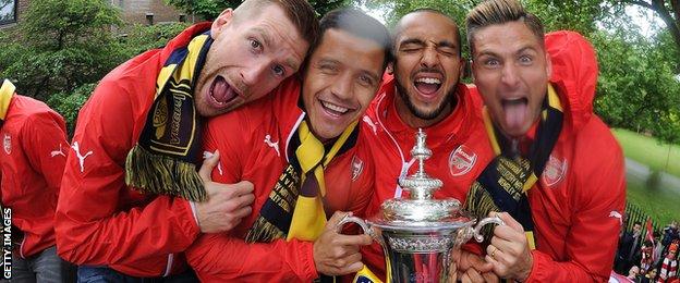 Arsenal players celebrate FA Cup win