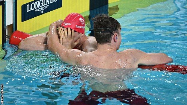 Brodie Williams hugs Luke Greenbank