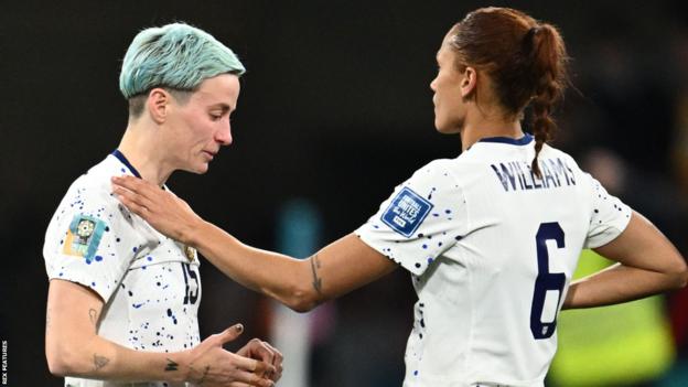 Megan Rapinoe (left) is consoled by team-mate Lynn Williams aft  the United States suffer  to Sweden connected  penalties astatine  the Women's World Cup