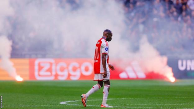 Ajax fans reacted after the team went 3-0 down against their fierce rivals
