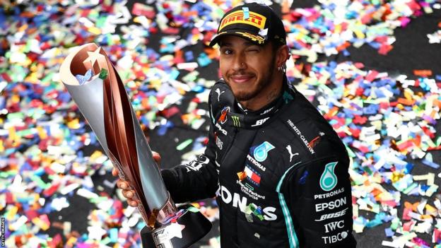 Lewis Hamilton celebrates winning the 2020 world title
