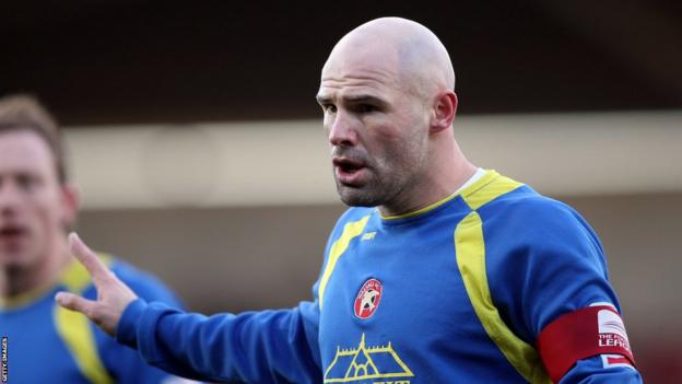 Tommy Mooney in action for Walsall