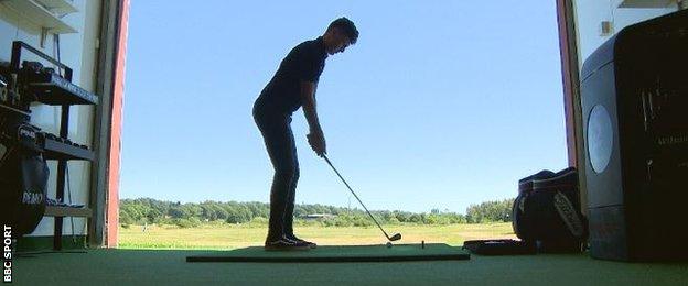 Sam Locke in the practice range at Paul Lawrie's golf centre
