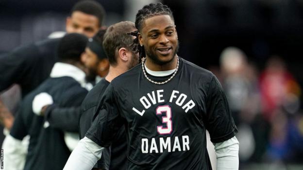 Las Vegas Raiders wide receiver Davante Adams wears a shirt with 'Love for Damar 3' on to honour Buffalo Bills player Damar Hamlin