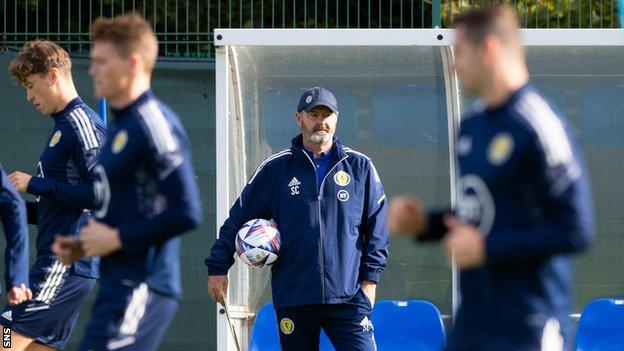 Steve Clarke watches his Scotland players in training