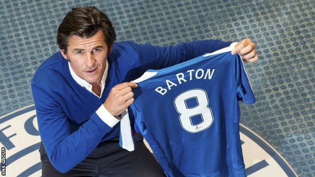 Joey Barton shows off his new Rangers jersey