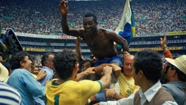 Pele celebrates winning a third World Cup following Brazil's win over Italy in the 1970 final
