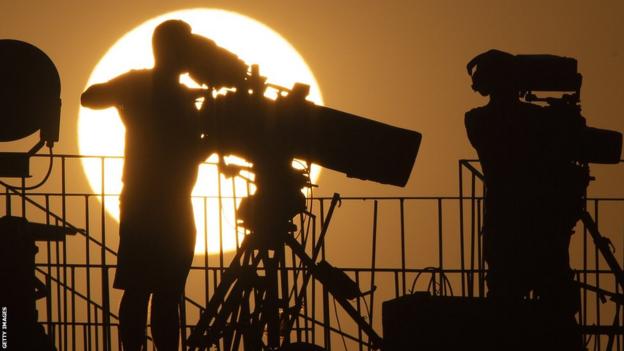 Cameramen film a match at the 2019 Africa Cup of Nations in Egypt