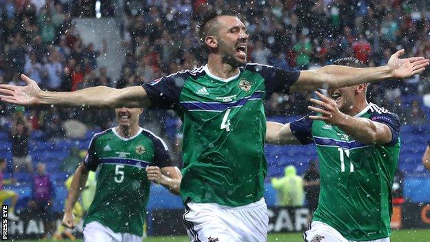 Gareth McAuley celebrates after scoring for Northern Ireland against Ukraine in the Euro 2016 finals