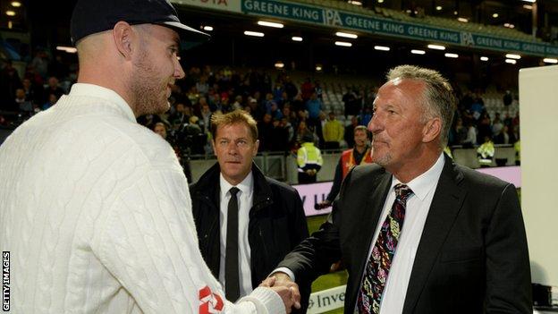 Stuart Broad shakes hands with Sir Ian Botham