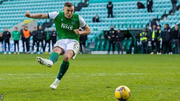 Hibs defender Ryan Porteous scores the winning penalty