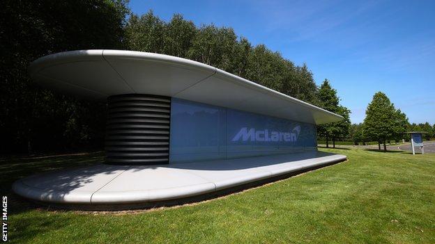 A sign with the McLaren logo outside the group's headquarters in Woking, Surrey