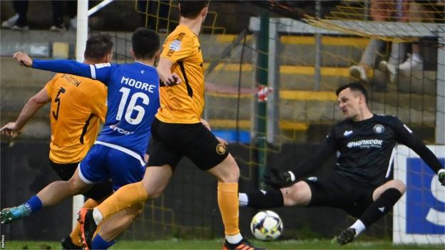 Joe Moore rifles home the equaliser past Rangers keeper Ross Glendinning