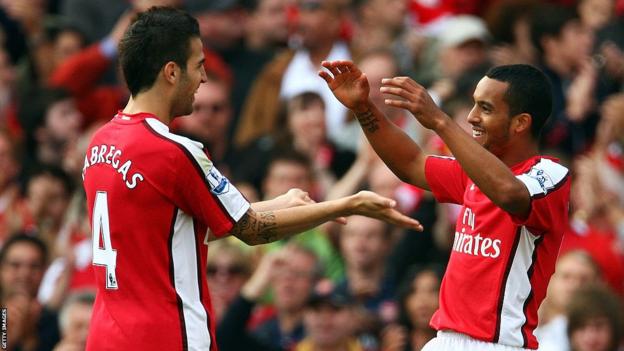 Cesc Fabregas and Theo Walcott celebrate after Fabregas set up Walcott to score in Arsenal's 6-2 win over Blackburn in October 2009
