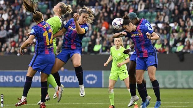 Barca's Marta Torrejon heads a ball