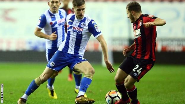 Wigan's Ryan Colclough in action against Bournemouth