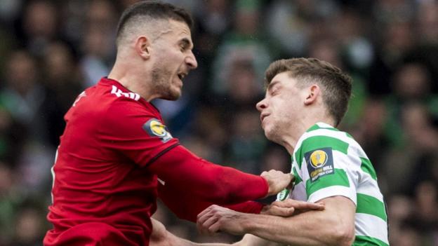 Celtic’s Christie taken off with neck in brace after sickening aerial collision