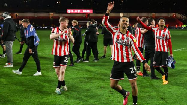 Iliman Ndiaye celebrates Sheffield United's promotion to the Premier League