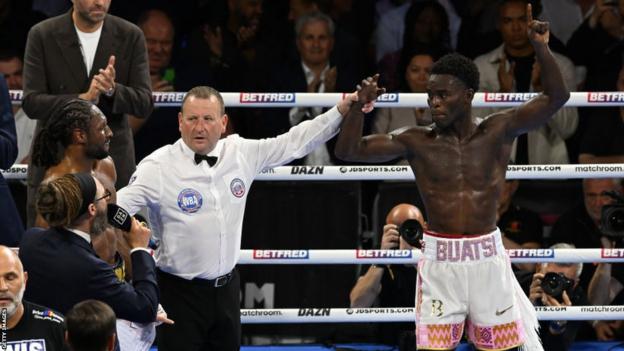 Joshua Buatsi celebrates following his win over Craig Richards