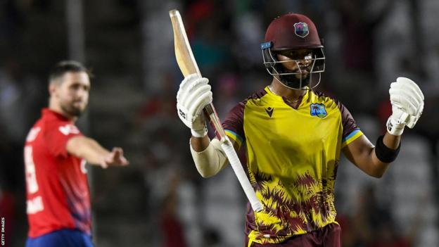 West Indies batter Shai Hope celebrates victory over England