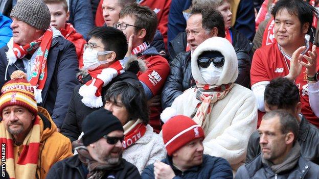 Fans wearing protective face masks during Liverpool v Bournemouth on Saturday