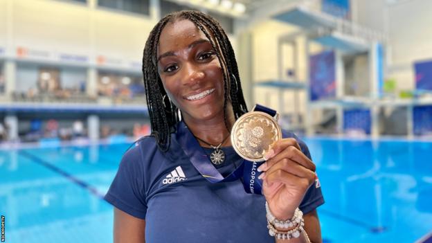 Desharne Bent-Ashmeil with golden  medal