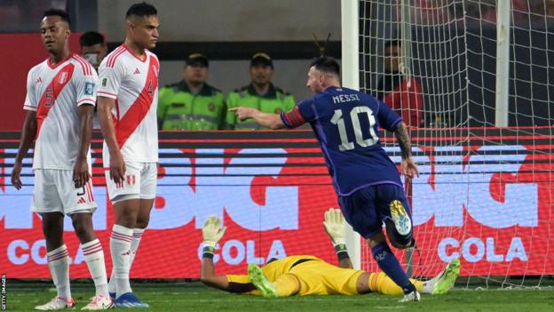Lionel Messi celebrates after scoring against Peru