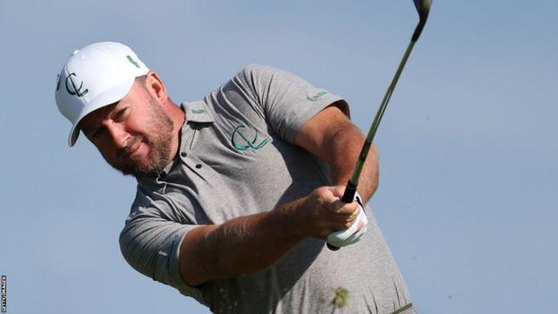 Graeme McDowell hitting a golf shot