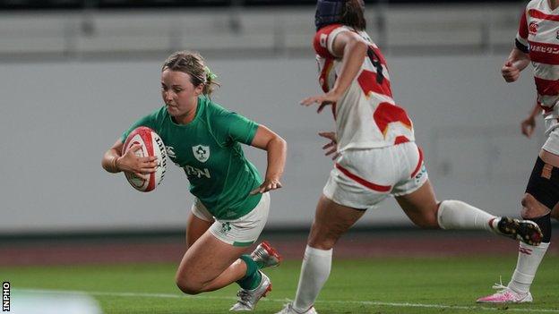 Aoife Dalton scores a try on her Test debut against Japan