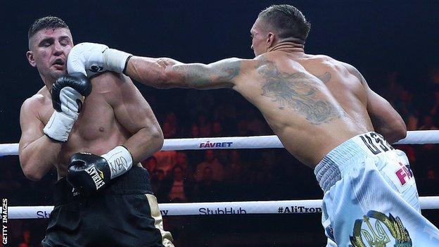 World Boxing Super Series: Oleksandr Usyk stops Marco Huck to defend