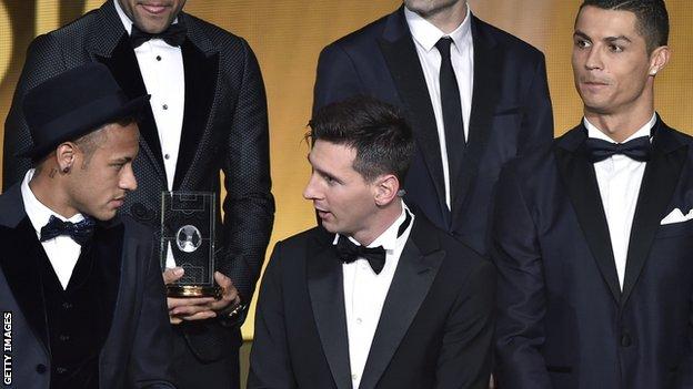 Ballon d'Or winner Lionel Messi talks to fellow nominee Neymar, as Cristiano Ronaldo looks on