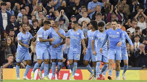 City players celebrate a goal against RB Leipzig