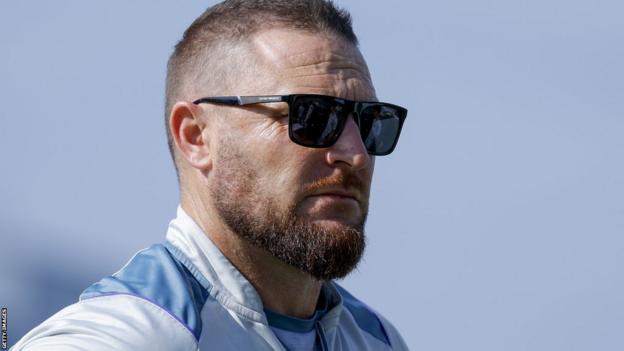 England Test coach Brendon McCullum looks on while wearing sunglasses