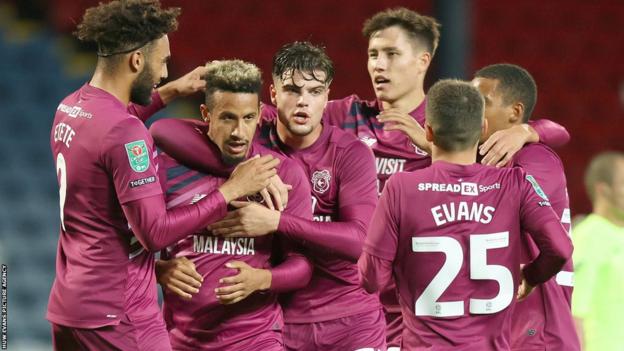 Callum Robinson celebrates his first goal of the season with his Cardiff team-mates