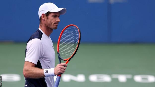 Andy Murray celebrates aft  winning a constituent   against Taylor Fritz successful  their last-16 lucifer  astatine  the Citi Open successful  Washington DC.