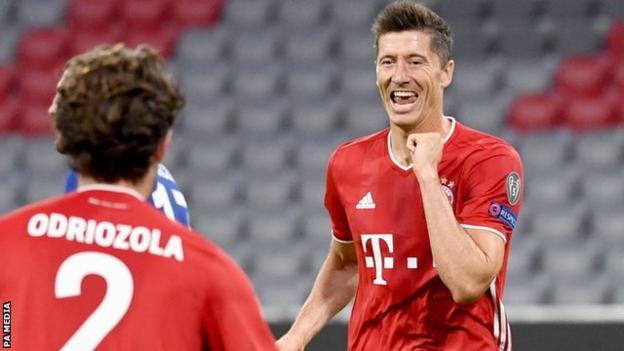 Robert Lewandowski celebrates scoring for Bayern Munich against Chelsea in the Europa League