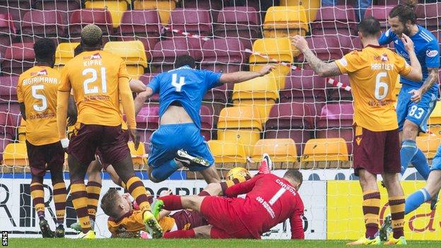 Aberdeen's Andrew Considine (centre) scrambles home the winning goal
