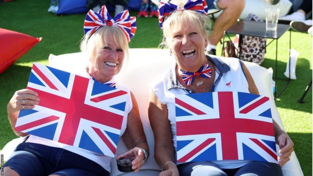 British fans wave flags at the Davis Cup tie