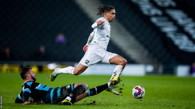 Tennai Watson in action for MK Dons against Forest Green at the Marshall Stadium in League One.